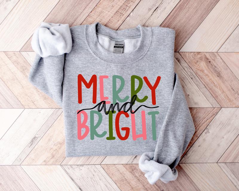 Merry and Bright Christmas Sweatshirt T-Shirt – Colorful Family Christmas Crewneck, Girly Holiday Sweater, Unisex Gift for Her in Full Sizes & Colors, Perfect Festive Top for Holiday Cheer