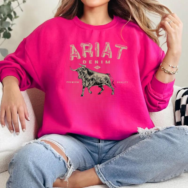 Ariat Denim - Premium Quality Sweatshirt - A stylish design featuring a bold bull graphic, perfect for those who appreciate western fashion and rugged style, unisex.