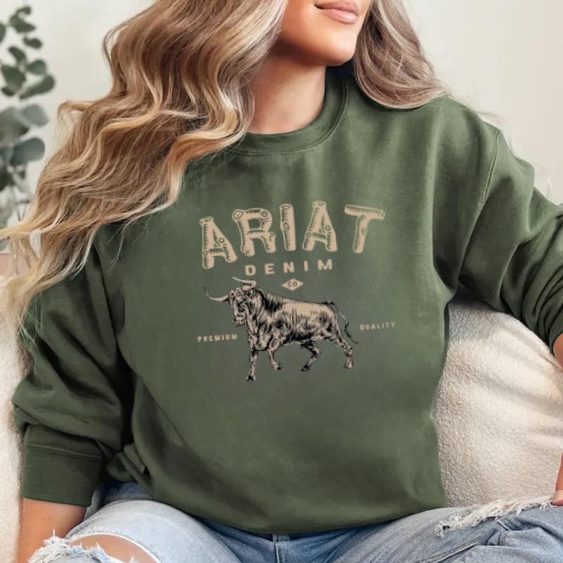 Ariat Denim - Premium Quality Sweatshirt - A stylish design featuring a bold bull graphic, perfect for those who appreciate western fashion and rugged style, unisex.