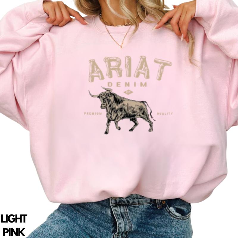 Ariat Denim - Premium Quality Sweatshirt - A stylish design featuring a bold bull graphic, perfect for those who appreciate western fashion and rugged style, unisex.