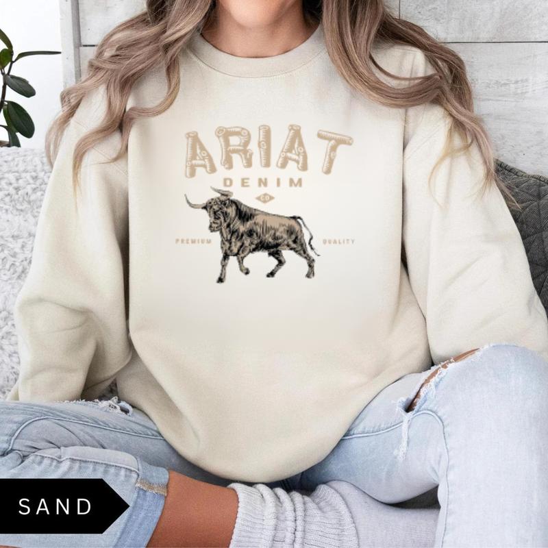 Ariat Denim - Premium Quality Sweatshirt - A stylish design featuring a bold bull graphic, perfect for those who appreciate western fashion and rugged style, unisex.