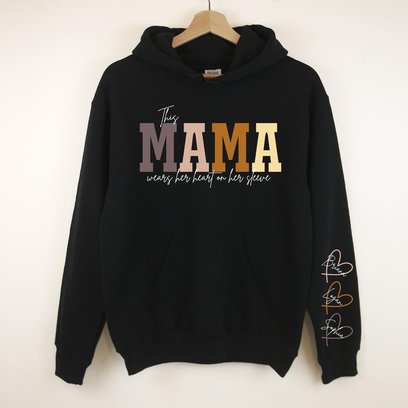 This Mama Wears Her Heart On Her Sleeve, Personalizable, Hoodie Sweatshirt or Crewneck Sweatshirt Long Sleeve Casual Comfortable Love Womenswear Mum Day Comfort